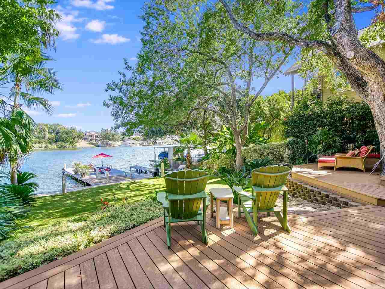 1705 Comanche Lane Kingsland, TX 78639 - Photo 1 of 1 a view of a chairs and table on the wooden deck