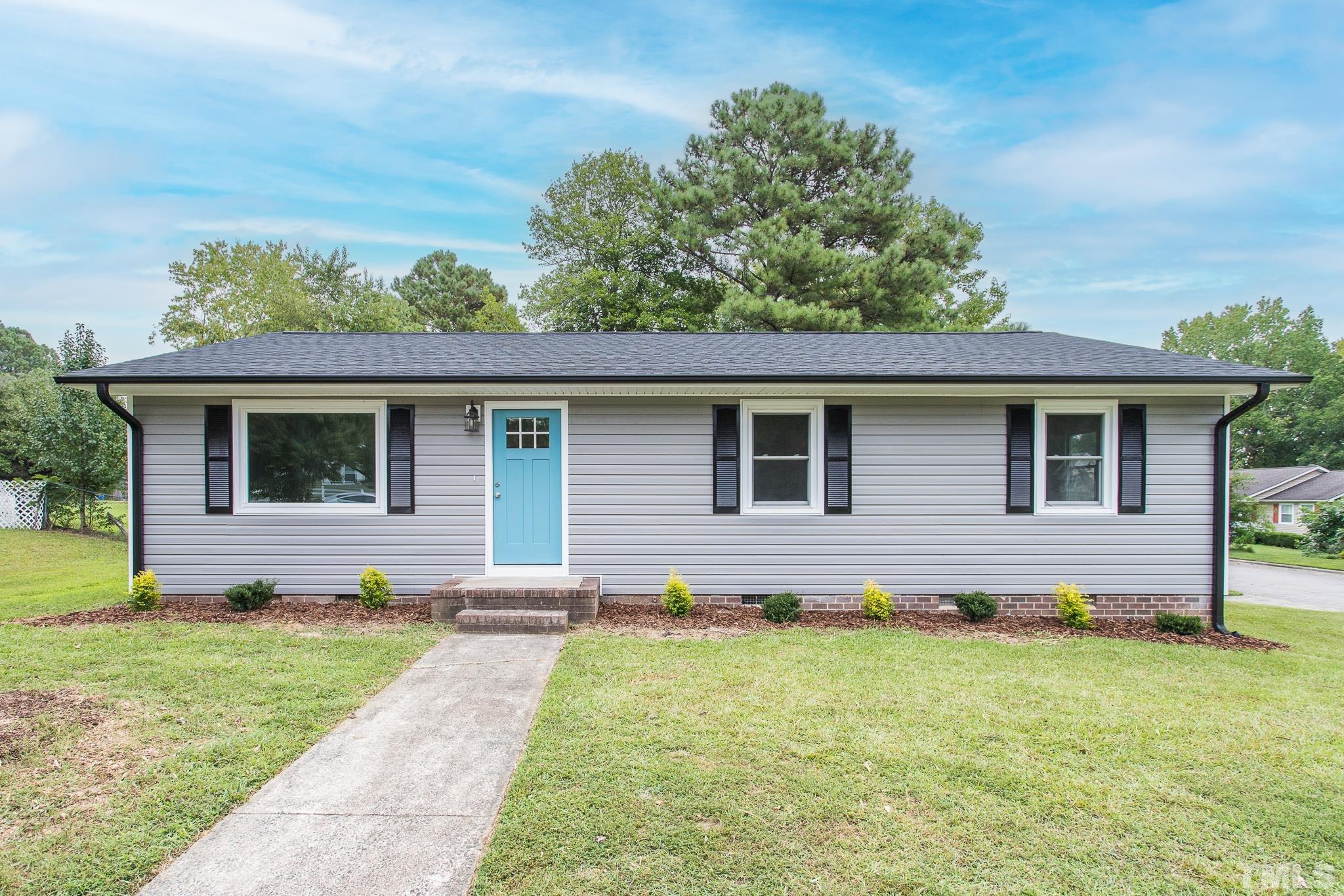 4000 Wheaton Road Durham, NC 27704 - Photo 1 of 21 a house view with a garden space