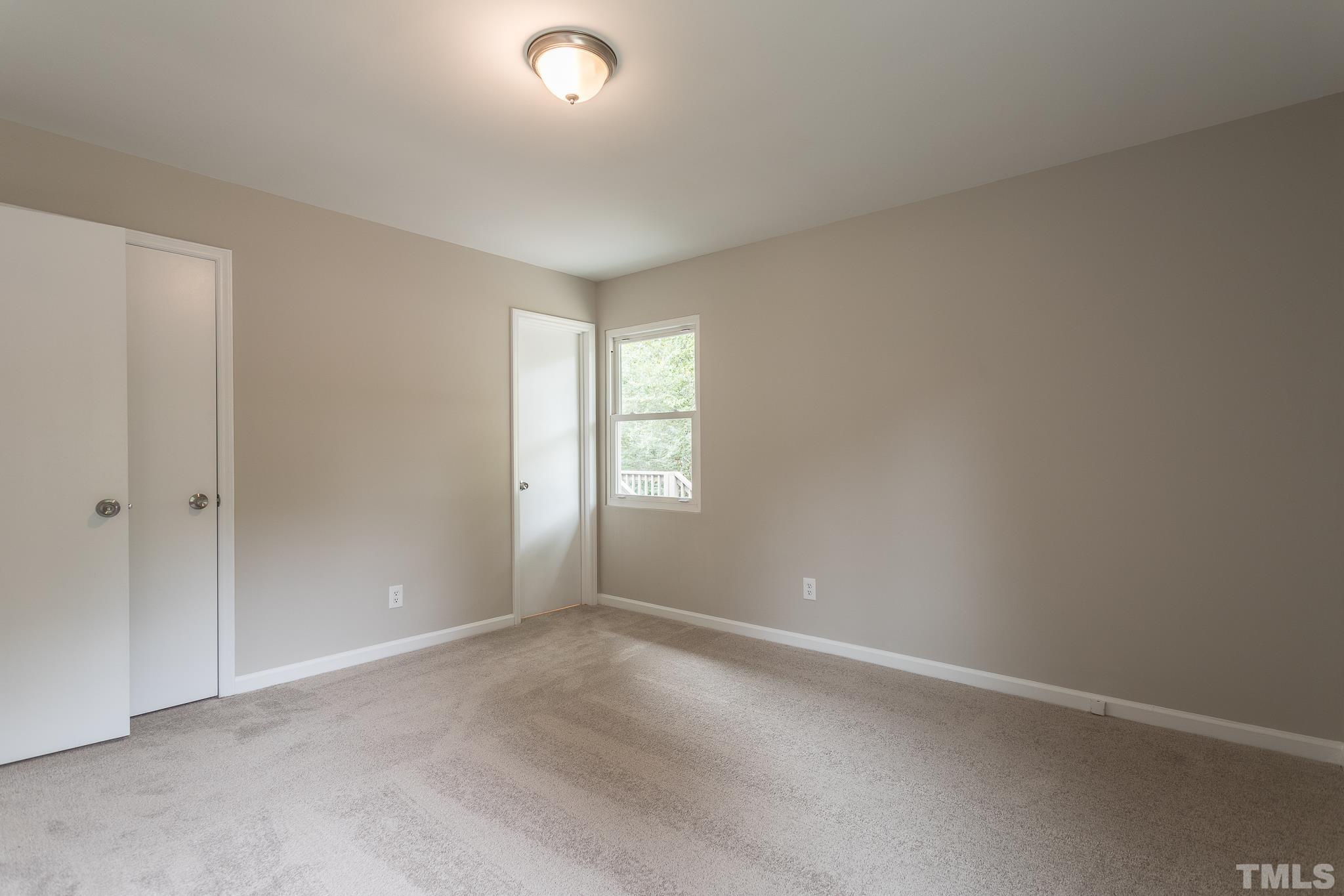 4000 Wheaton Road Durham, NC 27704 - Photo 13 of 21 a view of an empty room with a window