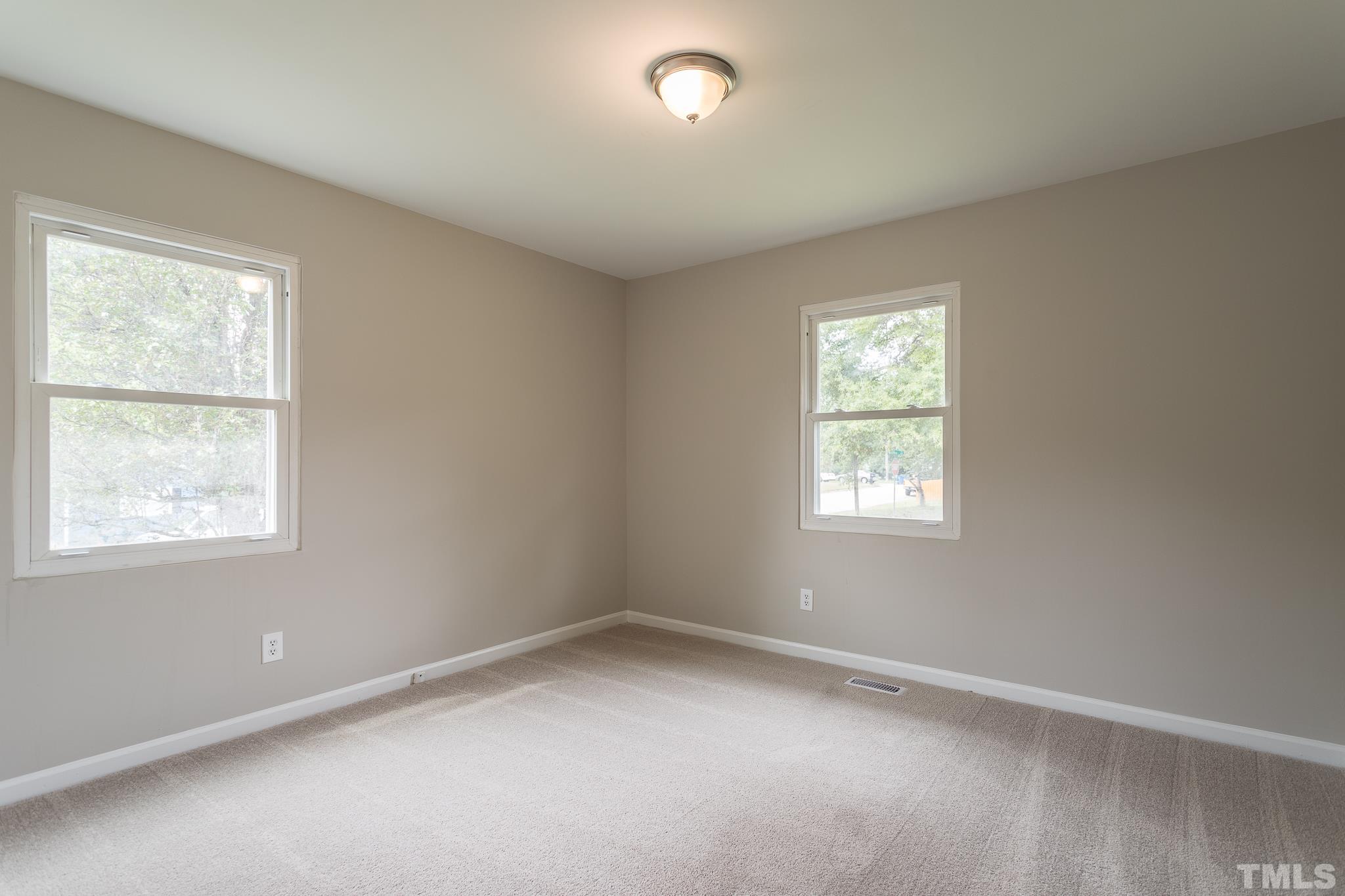 4000 Wheaton Road Durham, NC 27704 - Photo 14 of 21 an empty room with a window