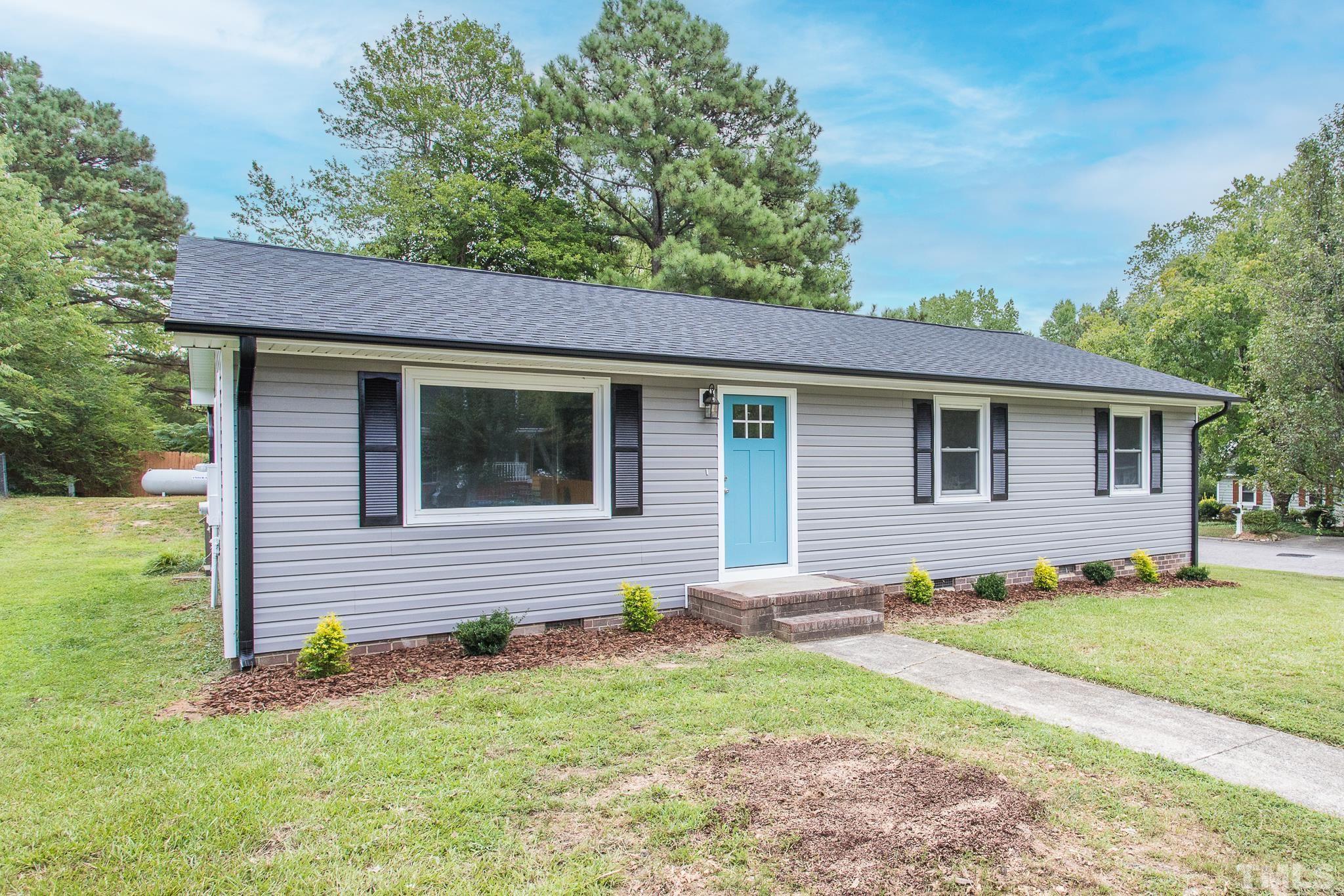 4000 Wheaton Road Durham, NC 27704 - Photo 17 of 21 a front view of a house with a yard