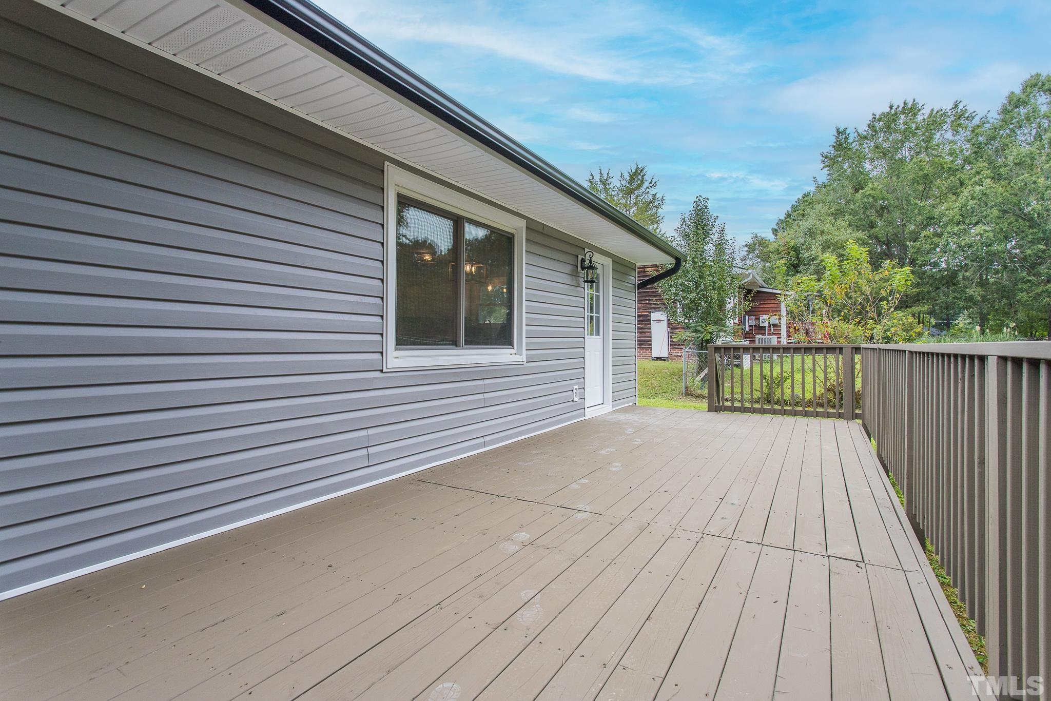 4000 Wheaton Road Durham, NC 27704 - Photo 20 of 21 a view of a house with wooden floor