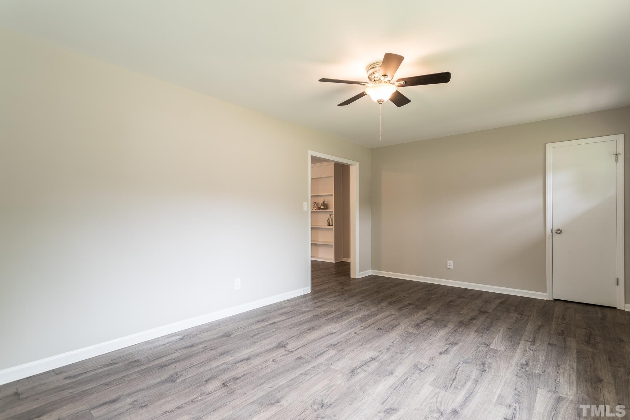 4000 Wheaton Road Durham, NC 27704 - Photo 4 of 21 a view of empty room with wooden floor