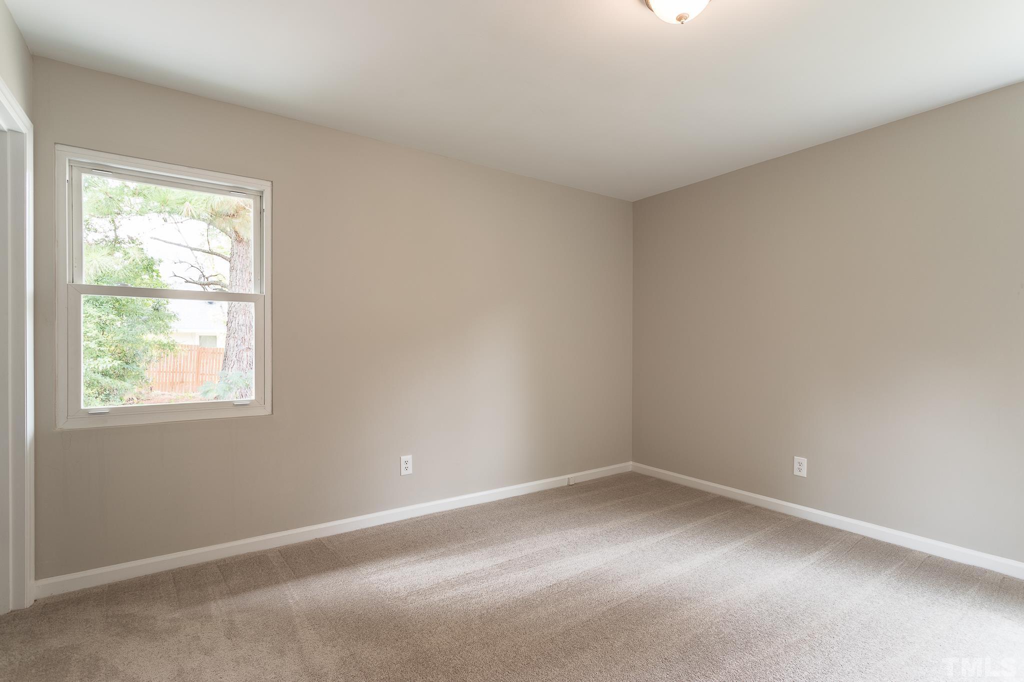 4000 Wheaton Road Durham, NC 27704 - Photo 7 of 21 an empty room with a window