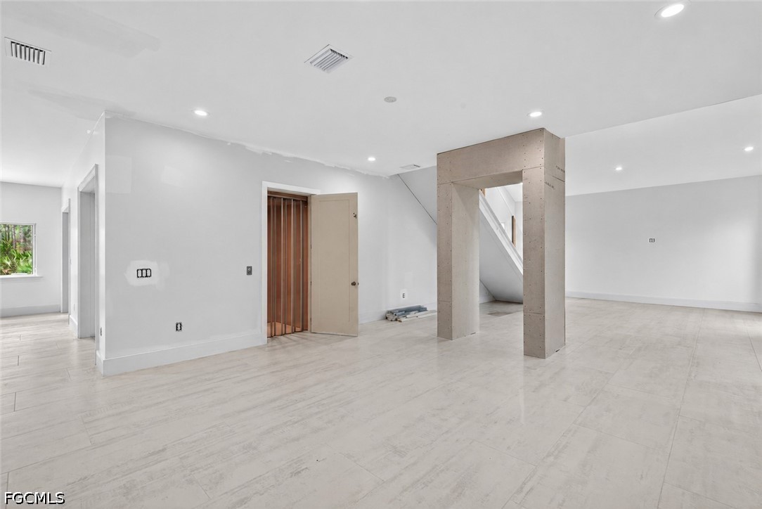 2665 Oil Well Road Naples, FL 34120 - Photo 8 of 40 a view of empty room
