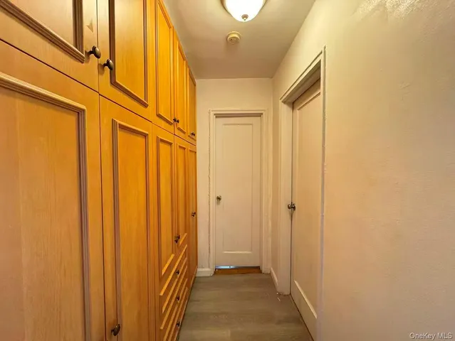 a view of a bathroom with shower curtain