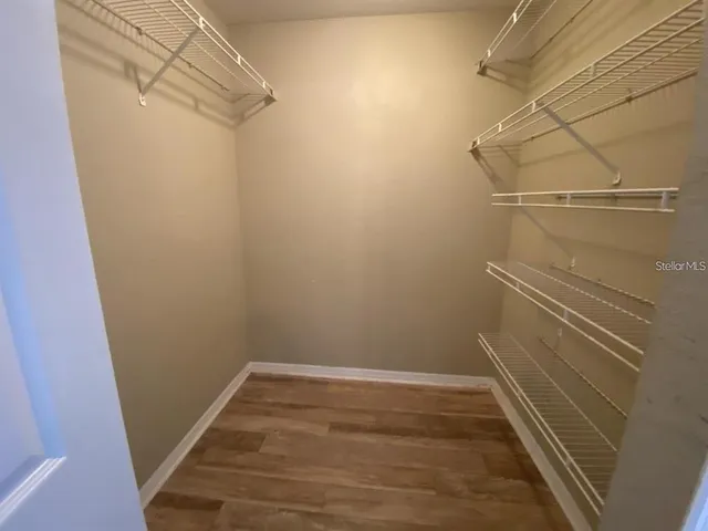 a view of a room with racks on the wall