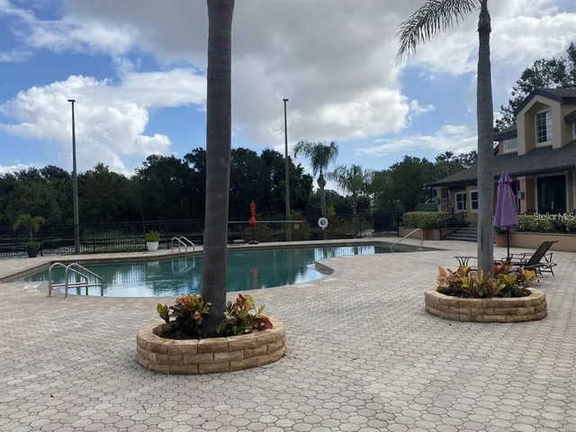 a lake view with a fountain and a fountain