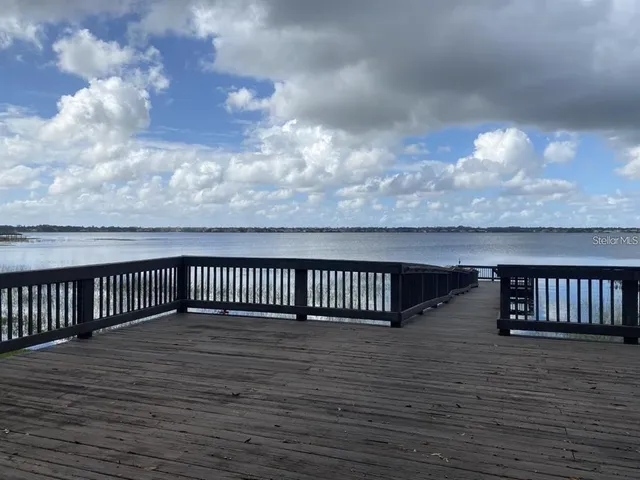 a balcony with wooden floor