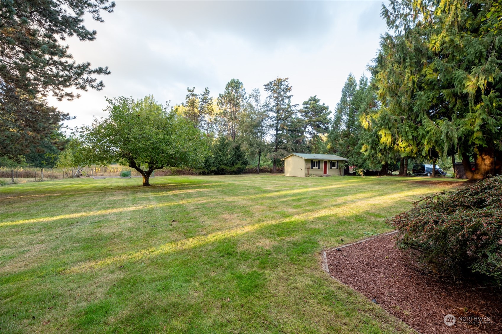 973 Koontz Road Chehalis, WA 98532 - Photo 21 of 25 a view of a ground with large trees