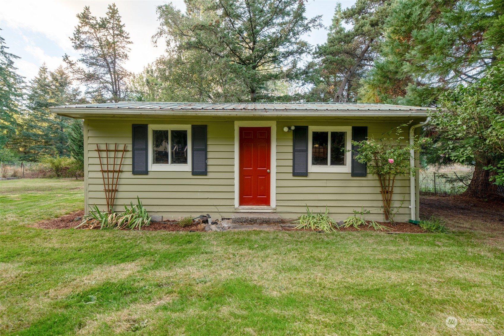 973 Koontz Road Chehalis, WA 98532 - Photo 22 of 25 a view of a house with a yard