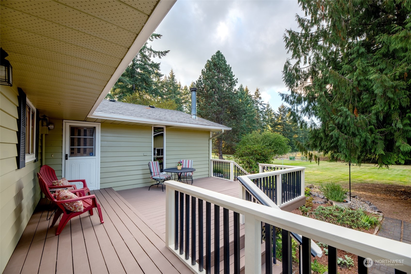 973 Koontz Road Chehalis, WA 98532 - Photo 6 of 25 a view of house with a chairs and table in a patio