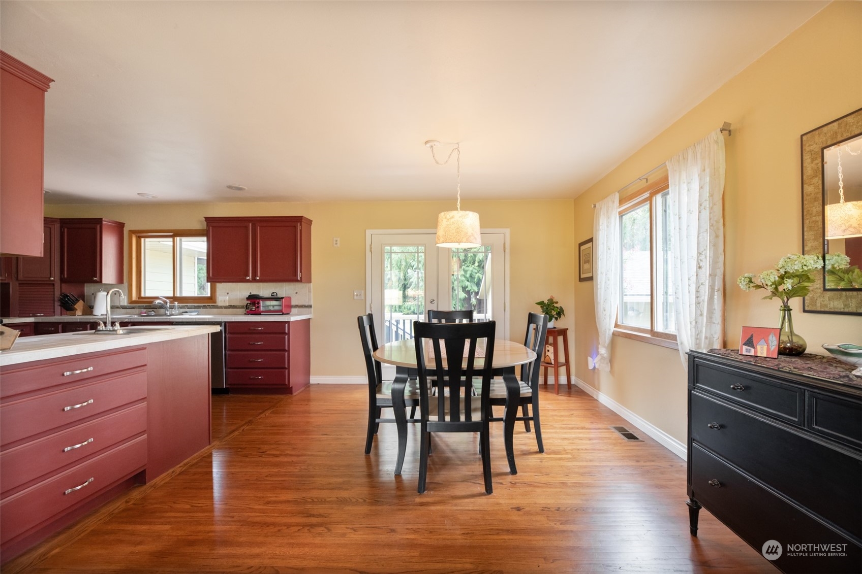 973 Koontz Road Chehalis, WA 98532 - Photo 10 of 25 a view of a dining room with furniture and windows