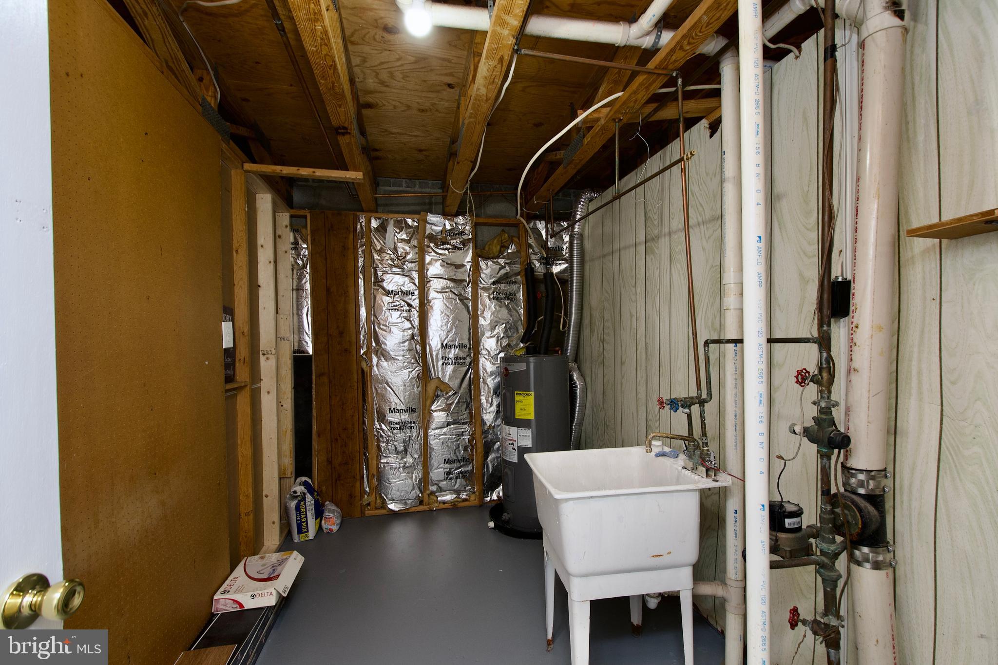 6005 Livingston Road Oxon Hill, MD 20745 - Photo 34 of 38 Laundry and storage rm