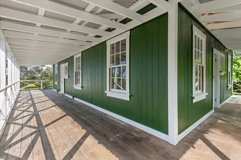 a view of backyard with green space