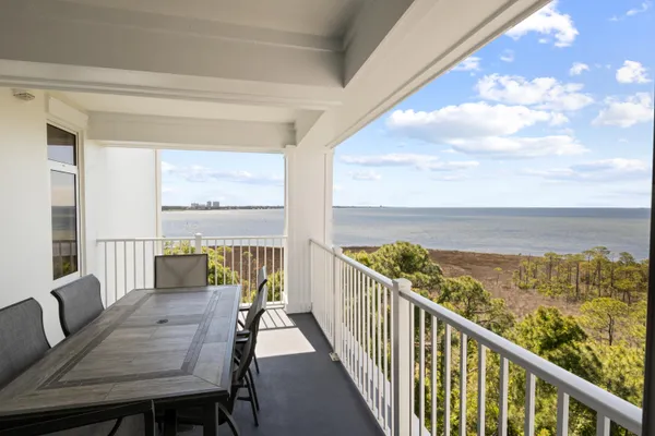 a view of a balcony with an ocean view