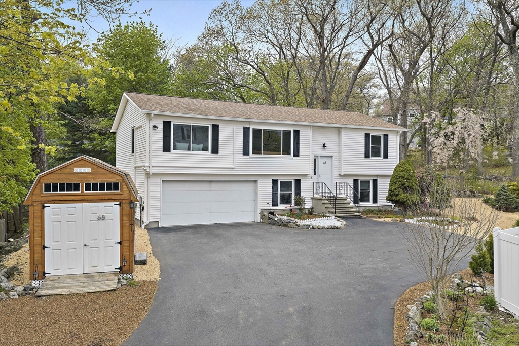 68 Dothan Street Arlington, MA 02474 - Photo 2 of 36 a view of a house with backyard and trees