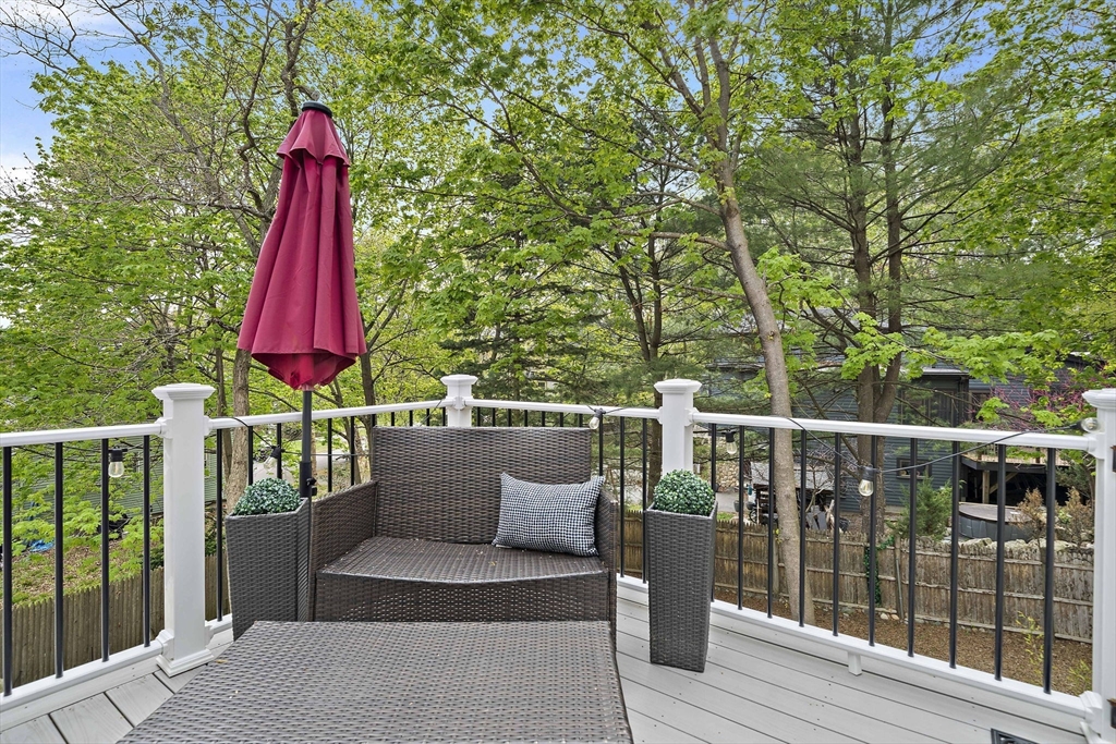 68 Dothan Street Arlington, MA 02474 - Photo 27 of 36 a view of a deck with a a table and chair