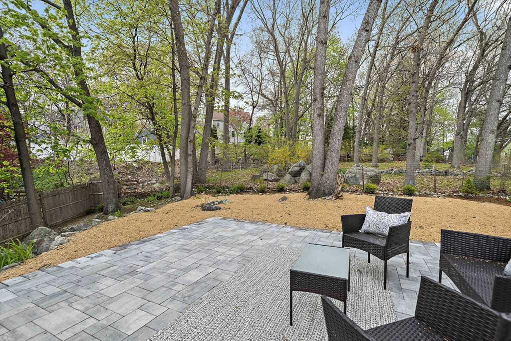 68 Dothan Street Arlington, MA 02474 - Photo 30 of 36 a swimming pool with outdoor seating and yard