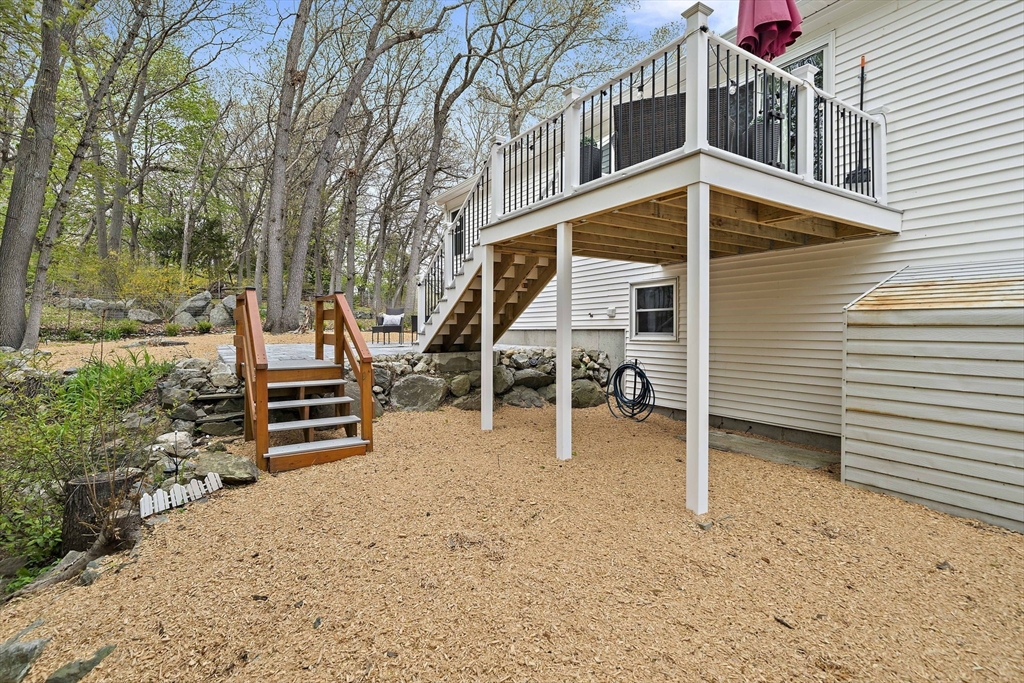 68 Dothan Street Arlington, MA 02474 - Photo 31 of 36 a view of house with backyard and deck