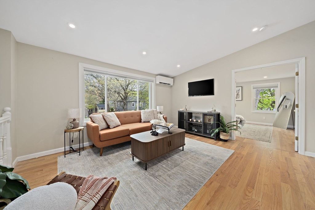 68 Dothan Street Arlington, MA 02474 - Photo 4 of 36 a living room with furniture and a flat screen tv