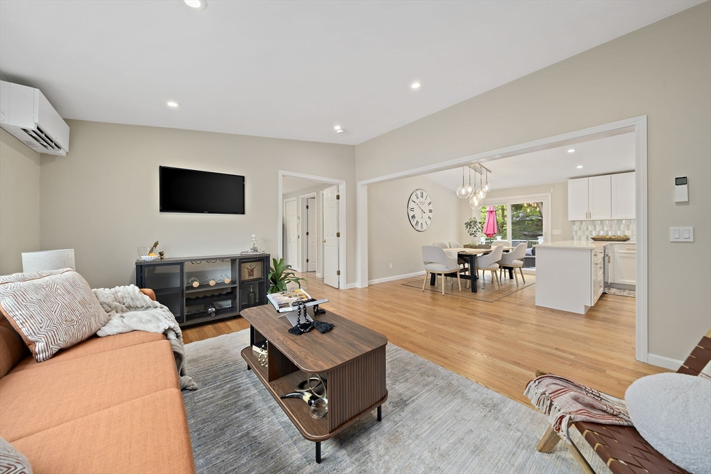 68 Dothan Street Arlington, MA 02474 - Photo 6 of 36 a living room with furniture and a flat screen tv
