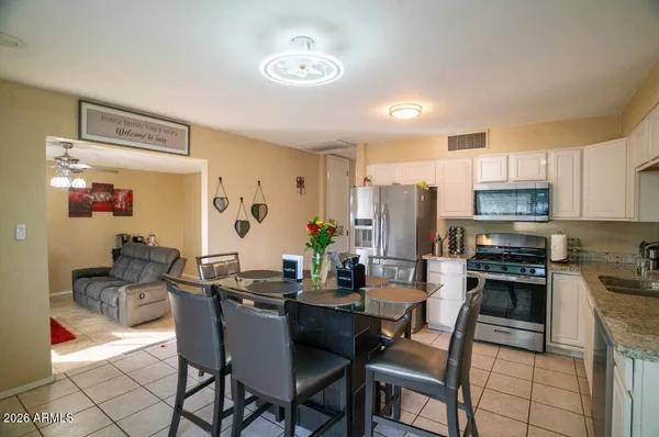 a view of a dining room with furniture