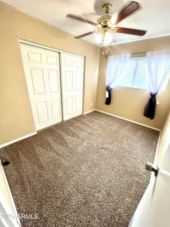 a view of an empty room with window