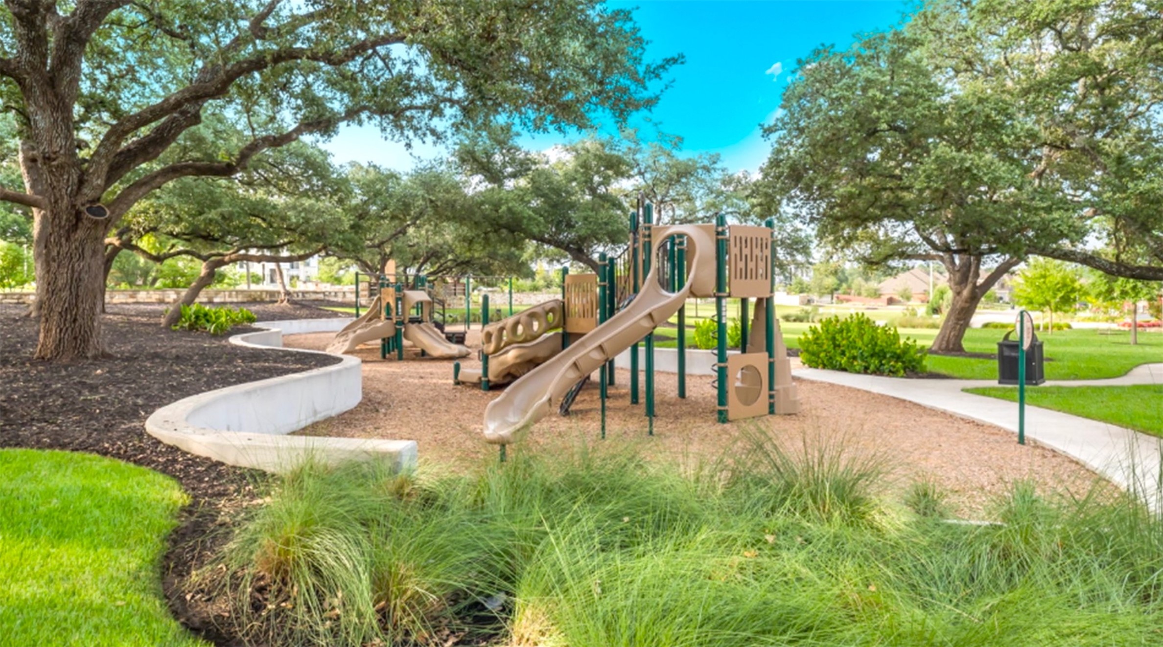 606 Linares Lane Austin, TX 78748 - Photo 11 of 34 a park view with a bench