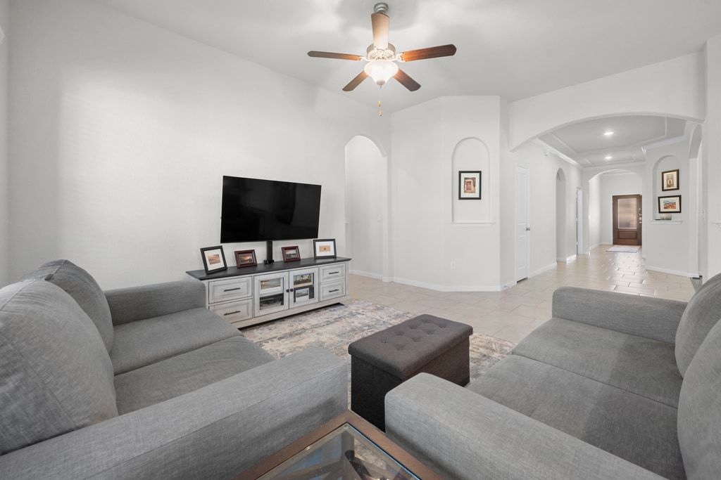 606 Linares Lane Austin, TX 78748 - Photo 17 of 35 Living room with recessed lighting and a ceiling fan