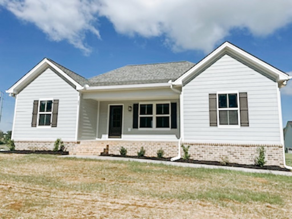 243 Tom Ferrell Road Portland, TN 37148 - Photo 1 of 17 a front view of a house