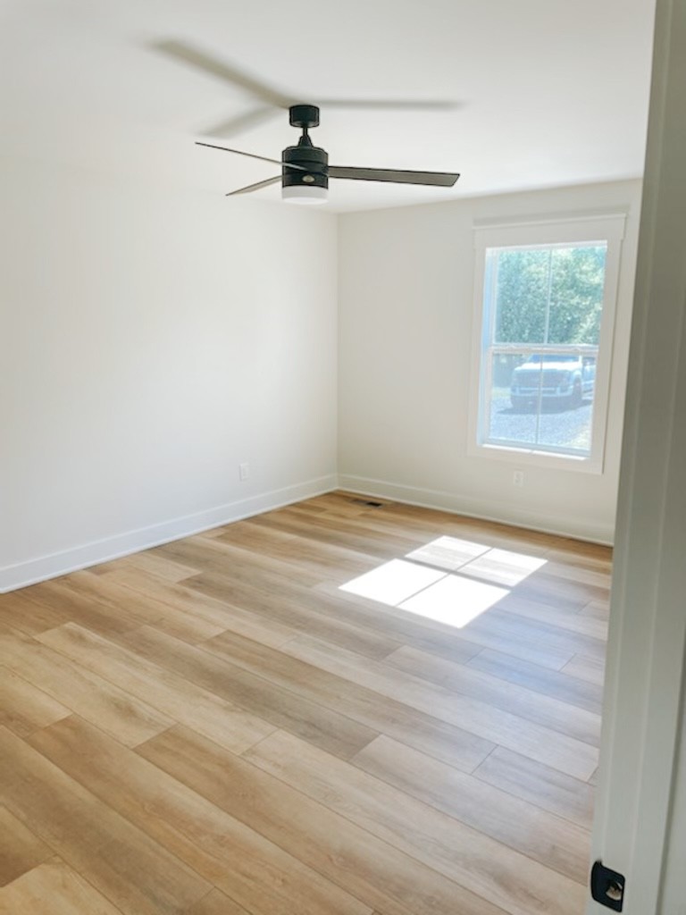 243 Tom Ferrell Road Portland, TN 37148 - Photo 12 of 17 an empty room with a empty space and a window