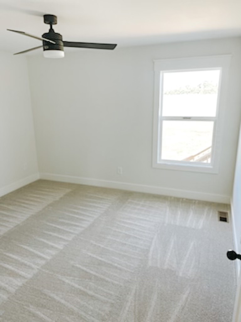 243 Tom Ferrell Road Portland, TN 37148 - Photo 17 of 17 an empty room with a window