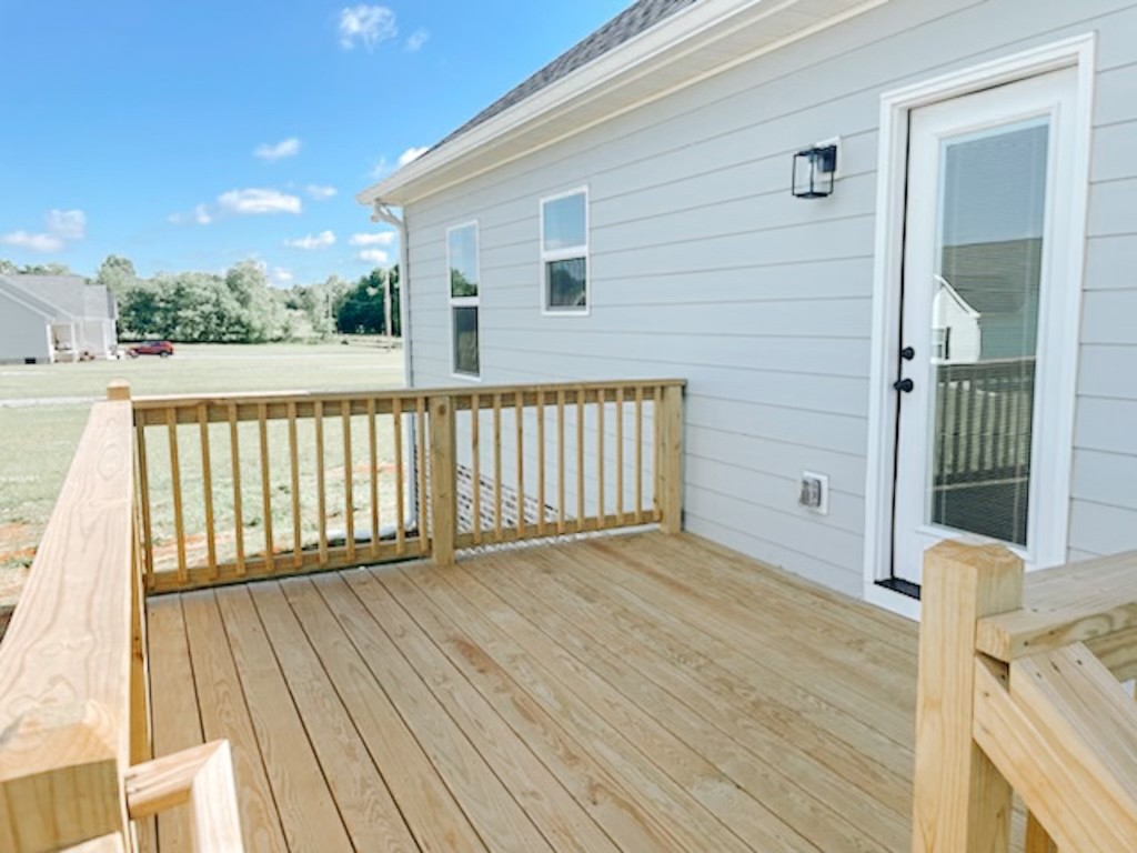 243 Tom Ferrell Road Portland, TN 37148 - Photo 4 of 17 a view of a wooden deck