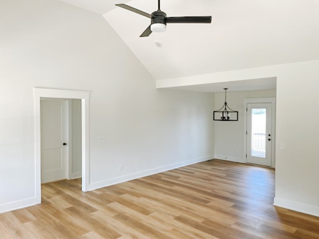 243 Tom Ferrell Road Portland, TN 37148 - Photo 6 of 17 a view of empty room with wooden floor