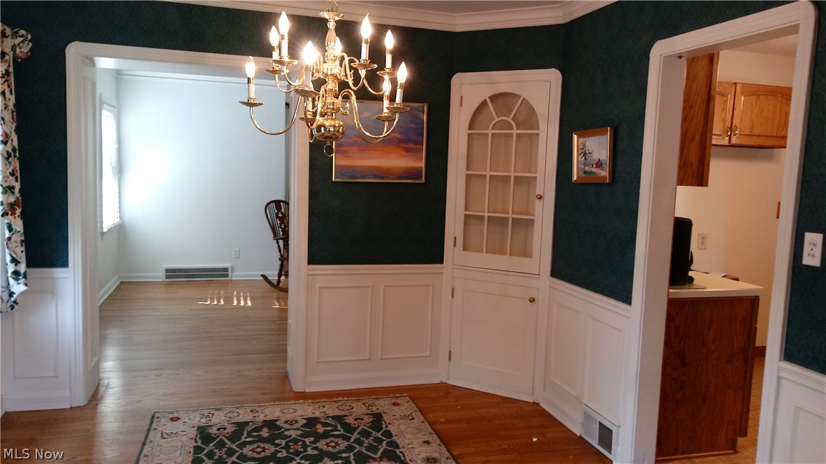 4181 Bushnell Road University Heights, OH 44118 - Photo 7 of 22 Beautiful chair rail with wainscoting and corner cupboard.