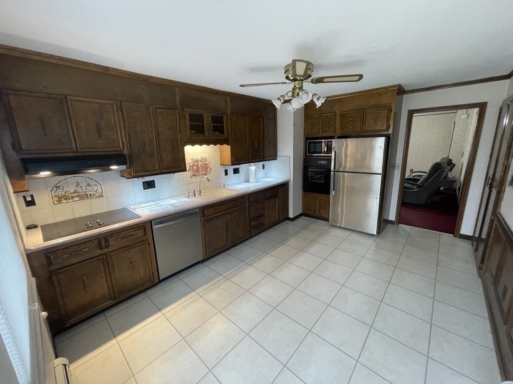 90 Colonial Circle, Unit A Chicopee, MA 01020 - Photo 6 of 17 a kitchen with a cabinets and steel stainless steel appliances