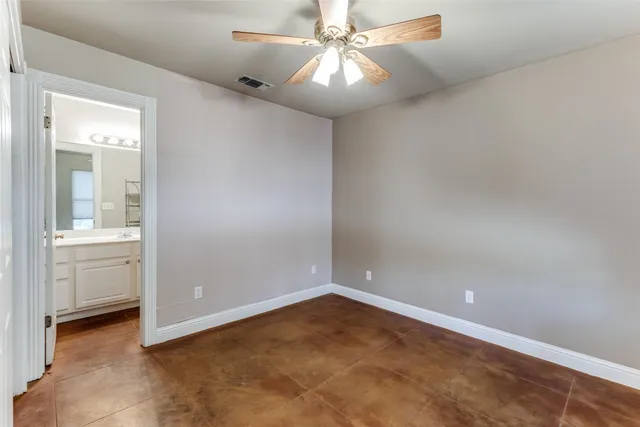 a bathroom with a sink double vanity and a mirror