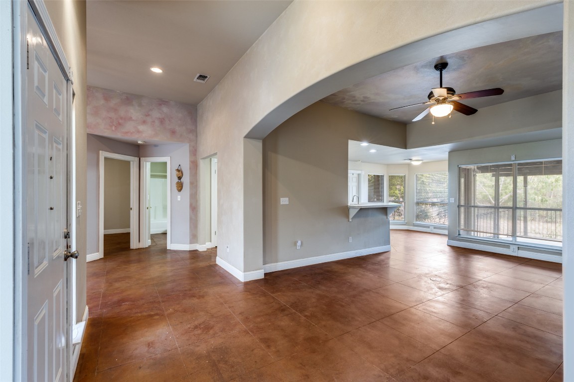 5718 McCarty Lane, Unit B Austin, TX 78749 - Photo 2 of 25 wooden floor in an empty room with a window