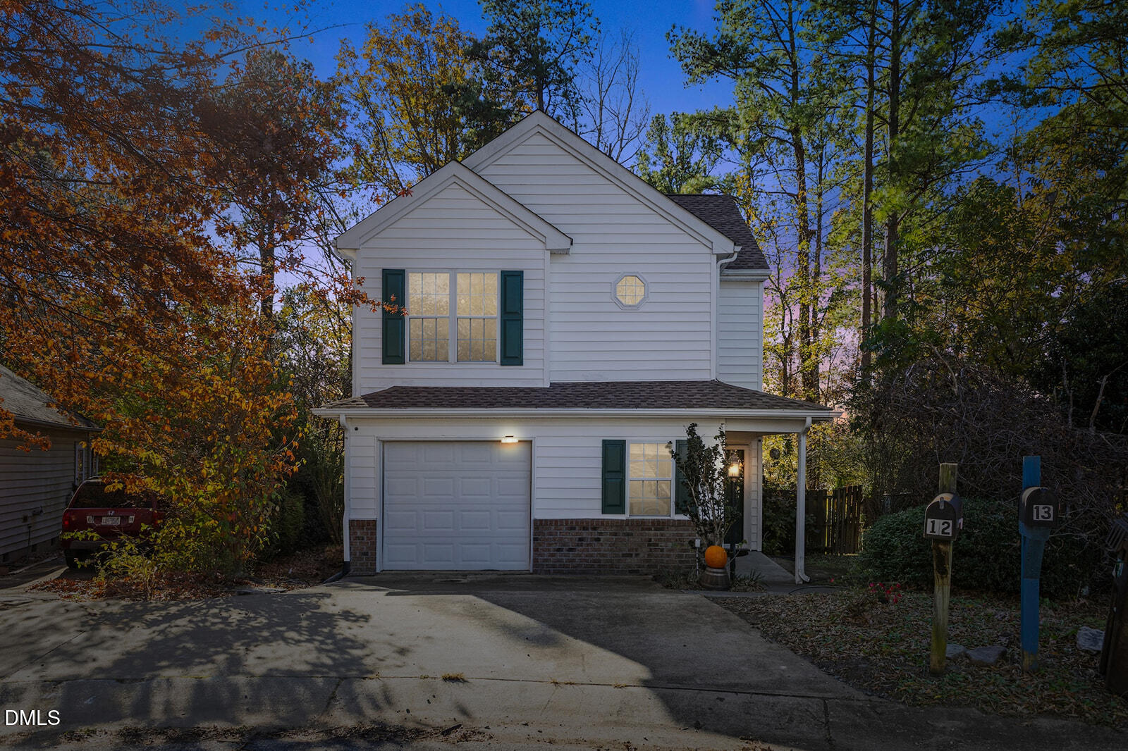 12 Byerly Court Durham, NC 27713 - Photo 1 of 28 a front view of a house with a yard and tree s