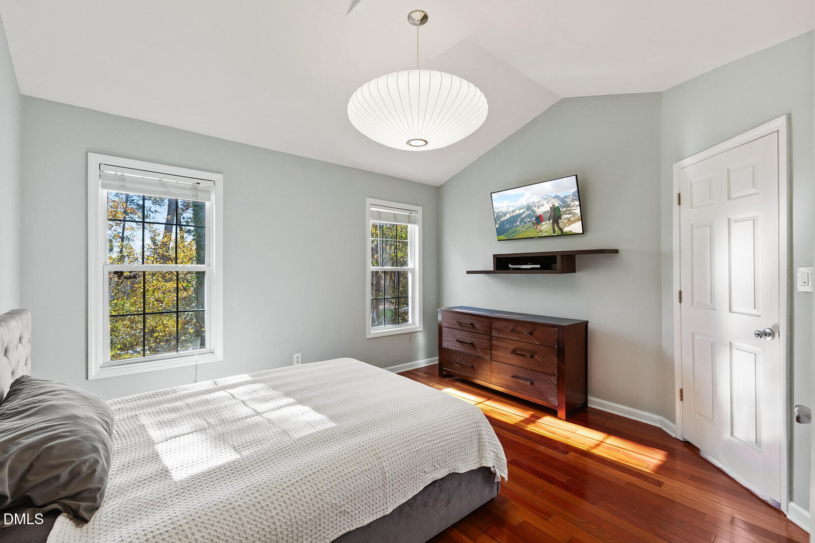 12 Byerly Court Durham, NC 27713 - Photo 14 of 28 a bedroom with a bed and a flat screen tv