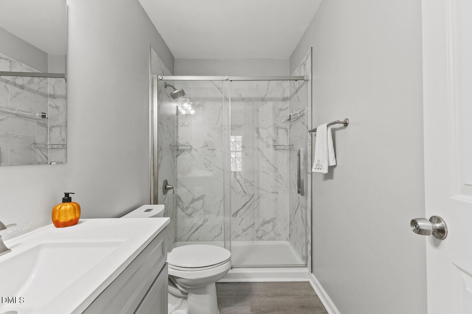 12 Byerly Court Durham, NC 27713 - Photo 15 of 28 a bathroom with a shower toilet and sink