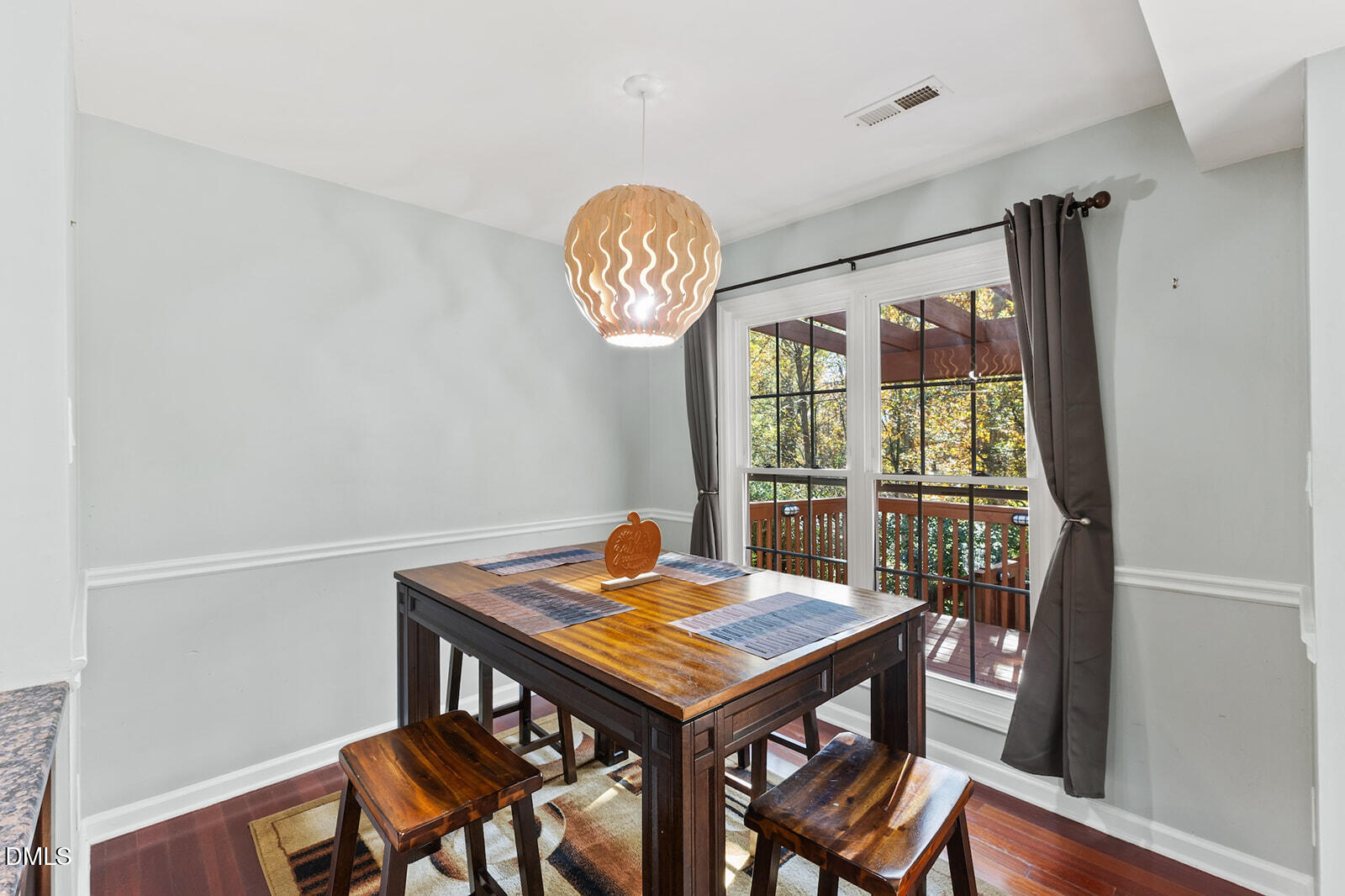 12 Byerly Court Durham, NC 27713 - Photo 5 of 28 a view of a dining room with furniture window and wooden floor