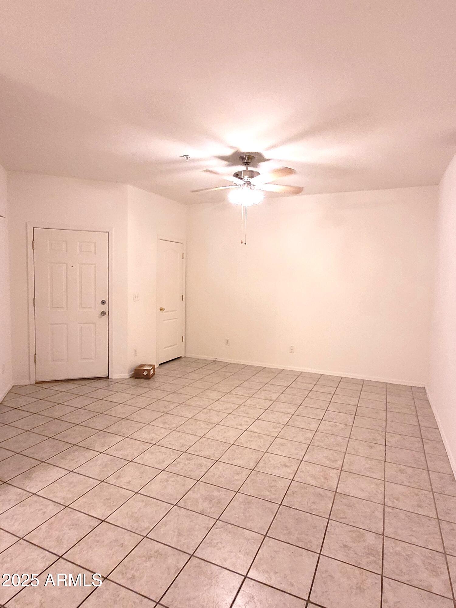 9151 West Greenway Road, Unit 152 Peoria, AZ 85381 - Photo 7 of 17 a view of an empty room