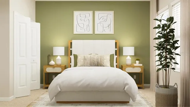 a spacious bedroom with a bed and a potted plant