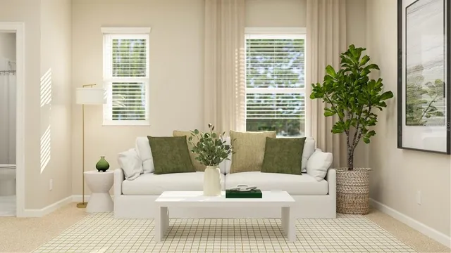 a living room with furniture and a large window