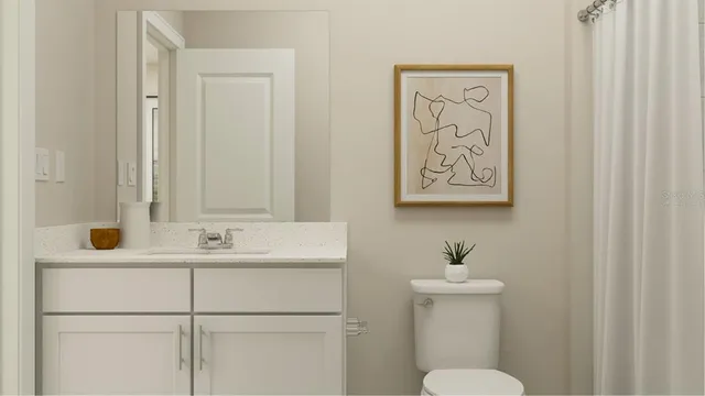 a bathroom with a sink a toilet and mirror