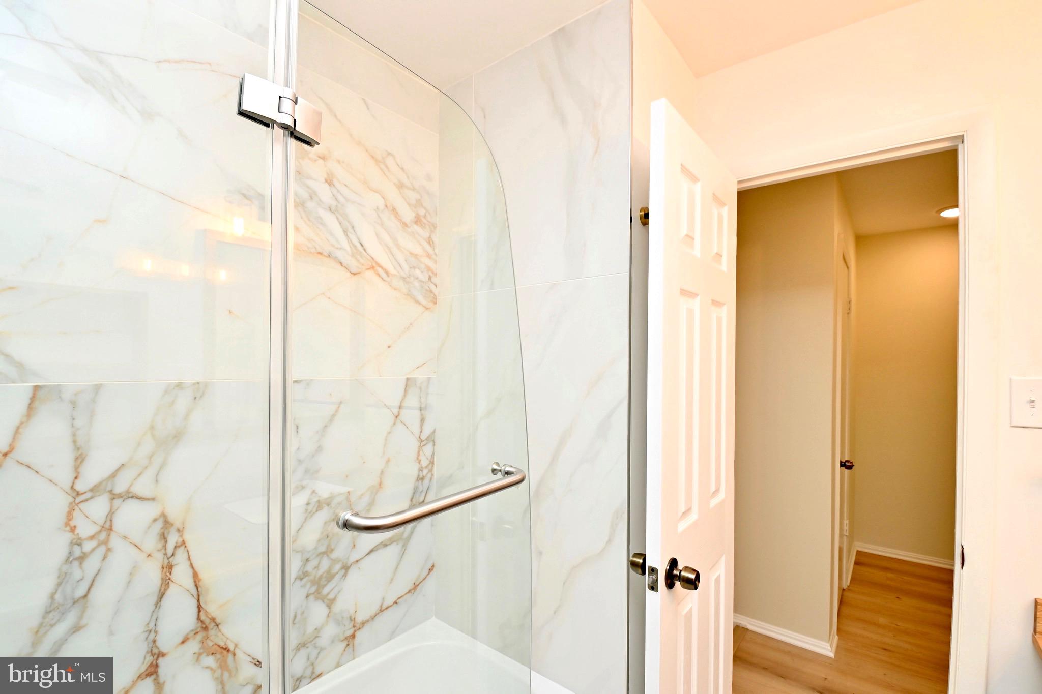 7215 Willow Oak Place Springfield, VA 22153 - Photo 21 of 39 a bathroom with a shower