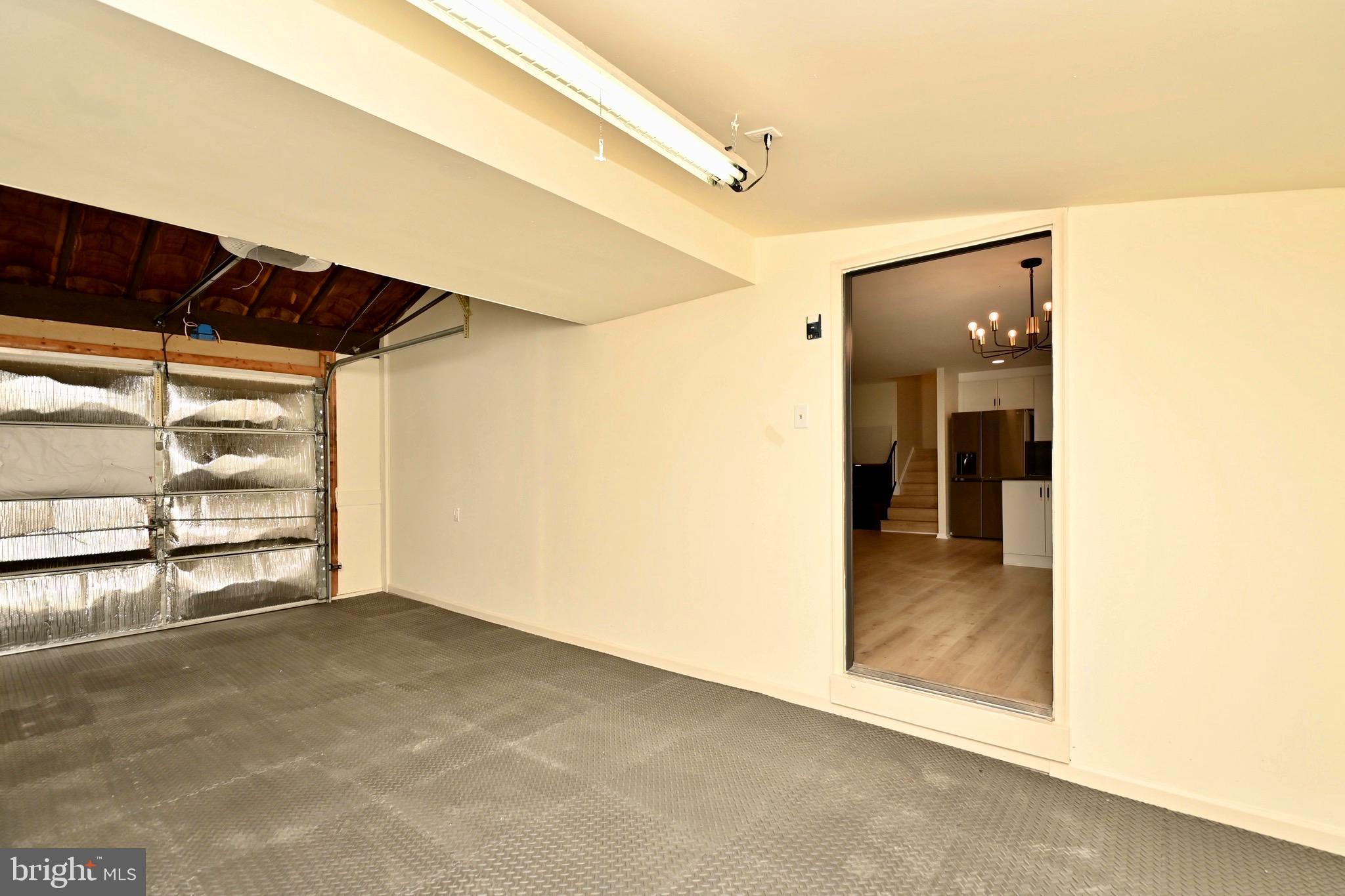 7215 Willow Oak Place Springfield, VA 22153 - Photo 33 of 39 a view of a hallway with wooden floor and entryway