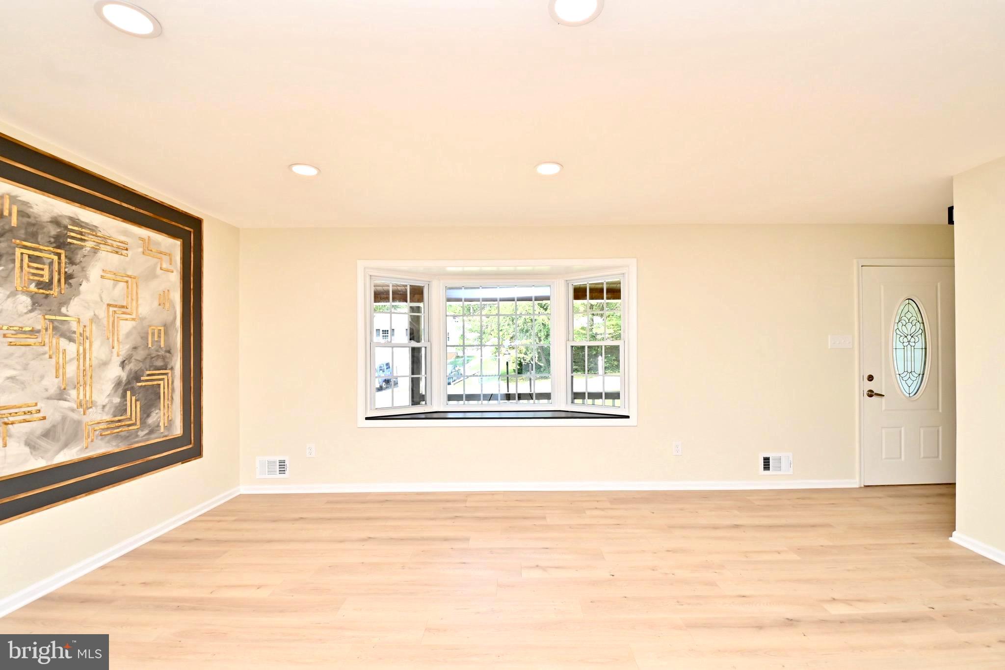 7215 Willow Oak Place Springfield, VA 22153 - Photo 6 of 39 a view of an empty room and window